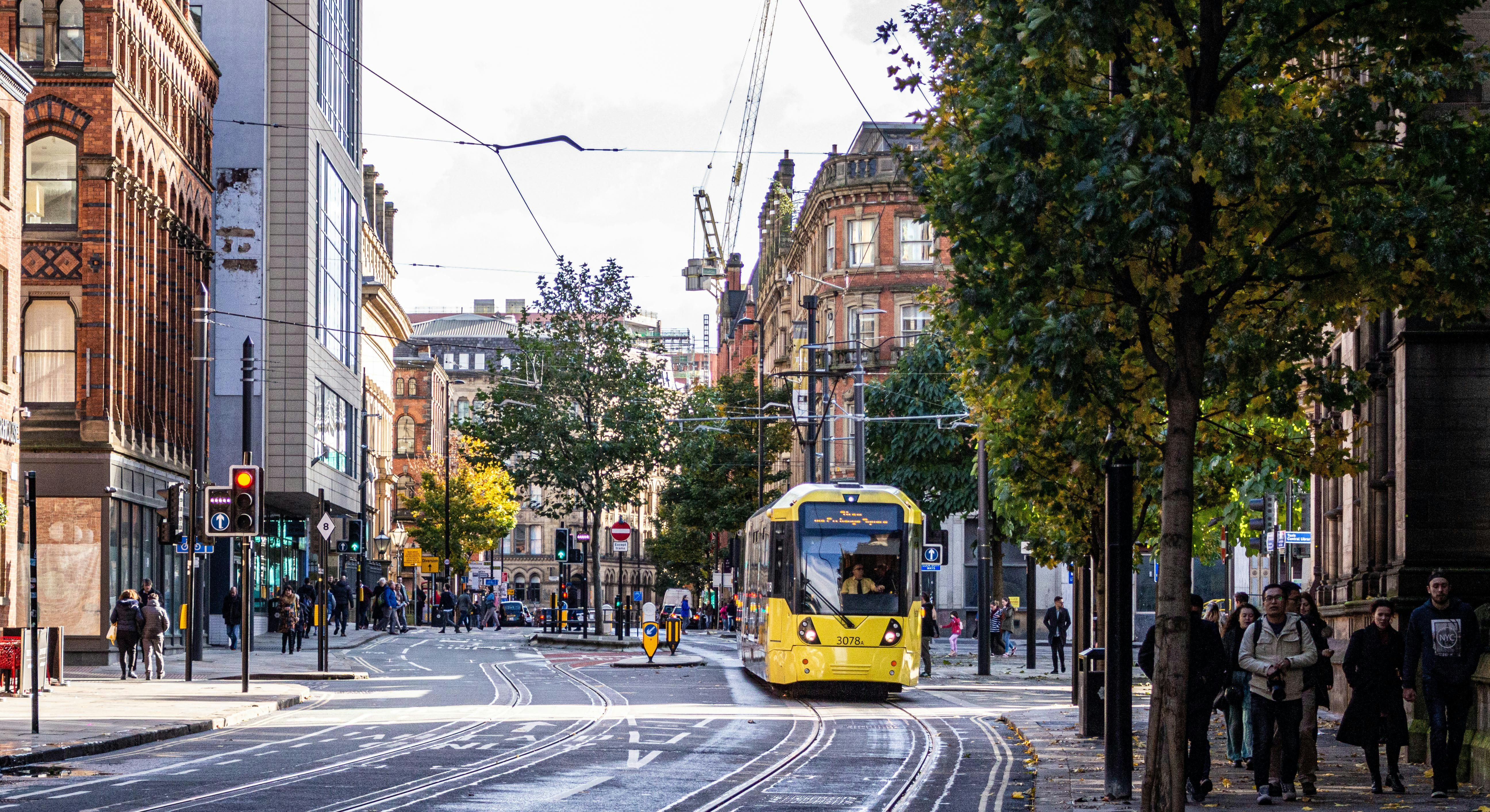 Metrolink tram on a Manchester city-centre street
